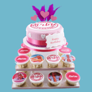 A Barbie Cake & Cupcake Tower featuring a round cake on the top tier with the iconic Barbie logo in bold pink tones, surrounded by multiple tiers of cupcakes. Each cupcake is decorated with Barbie-themed designs such as silhouettes, accessories, and vibrant colours that match the main cake. Delicate feather toppers add a whimsical touch, and a personalised message plaque is displayed at the front. The tower is stylish, playful, and perfect for Barbie-themed birthdays or special events, creating a bright and memorable party centrepiece.