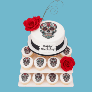 A multi-tiered cupcake tower with a round cake at the center, decorated with a vibrant Day of the Dead sugar skull design. Surrounding the cake are numerous cupcakes, each topped with unique, colorful sugar skull motifs and elegant floral accents. The entire display is bold and festive, combining traditional cultural elements with artistic flair. Perfect for themed parties and celebrations, the tower is fully customisable in flavours, colours, and decorations, offering both visual impact and delicious variety for guests of all ages.