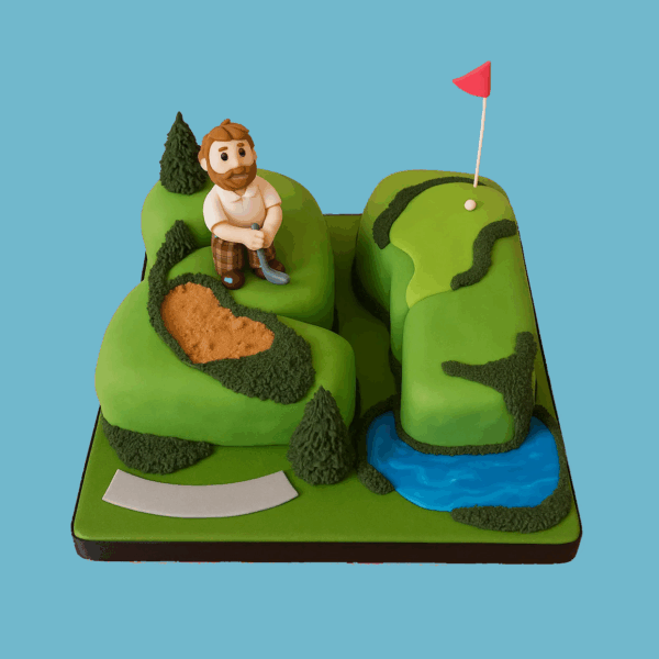 A shaped cake decorated with rich green fondant representing golf course fairways and a putting green. A blue fondant water hazard adds color, with a small white flag marking the hole. A detailed fondant golfer figure holding a club stands ready to swing on the green. The cake combines realistic golf elements and vibrant colors, making it a perfect centerpiece for golf-themed celebrations.