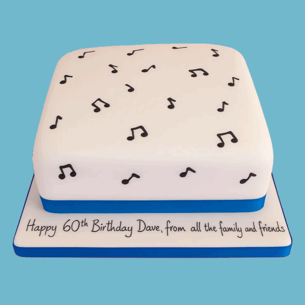 A square Musical Notes Cake with a smooth white fondant surface, decorated with scattered black musical symbols like treble clefs and quavers. A soft blue ribbon wraps around the base, adding a touch of colour to the black and white design, creating an elegant centerpiece for music-themed celebrations.