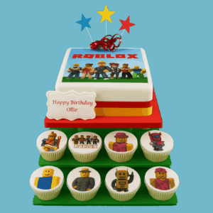 A vibrant Roblox-themed cupcake tower featuring a square cake decorated with the Roblox logo and detailed edible images of popular game characters. Surrounding the cake are multiple tiers of cupcakes, each topped with colourful Roblox avatars and themed designs. Star-shaped toppers add sparkle, and a personalised message plaque sits at the base. The bright colours and playful layout make it an ideal centrepiece for birthdays or gaming-themed parties, offering both visual appeal and delicious flavour for Roblox fans of all ages.