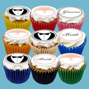 Box of 15 Wedding Cupcakes featuring tuxedo, bride, and groom toppers. Customisable flavours, perfect for weddings and bridal celebrations.